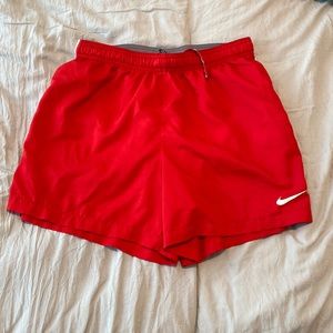 Red nike shorts